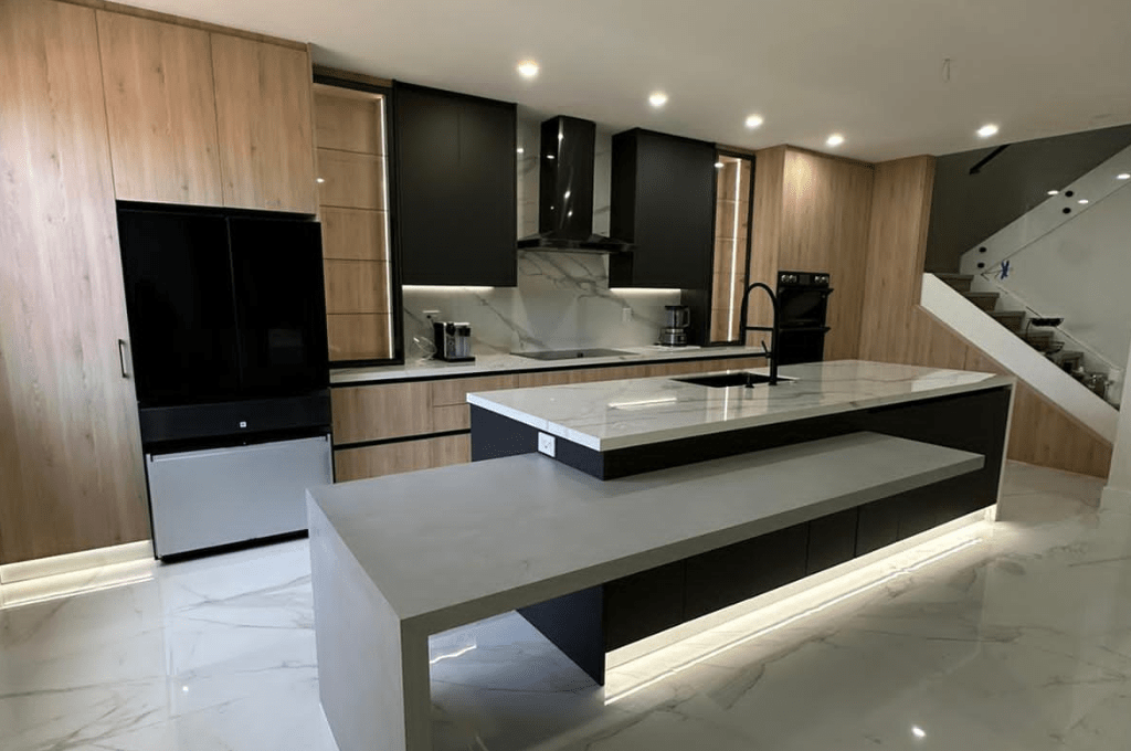 Modern Bliss: Wood, Black, and White Kitchen with Porcelain Elegance